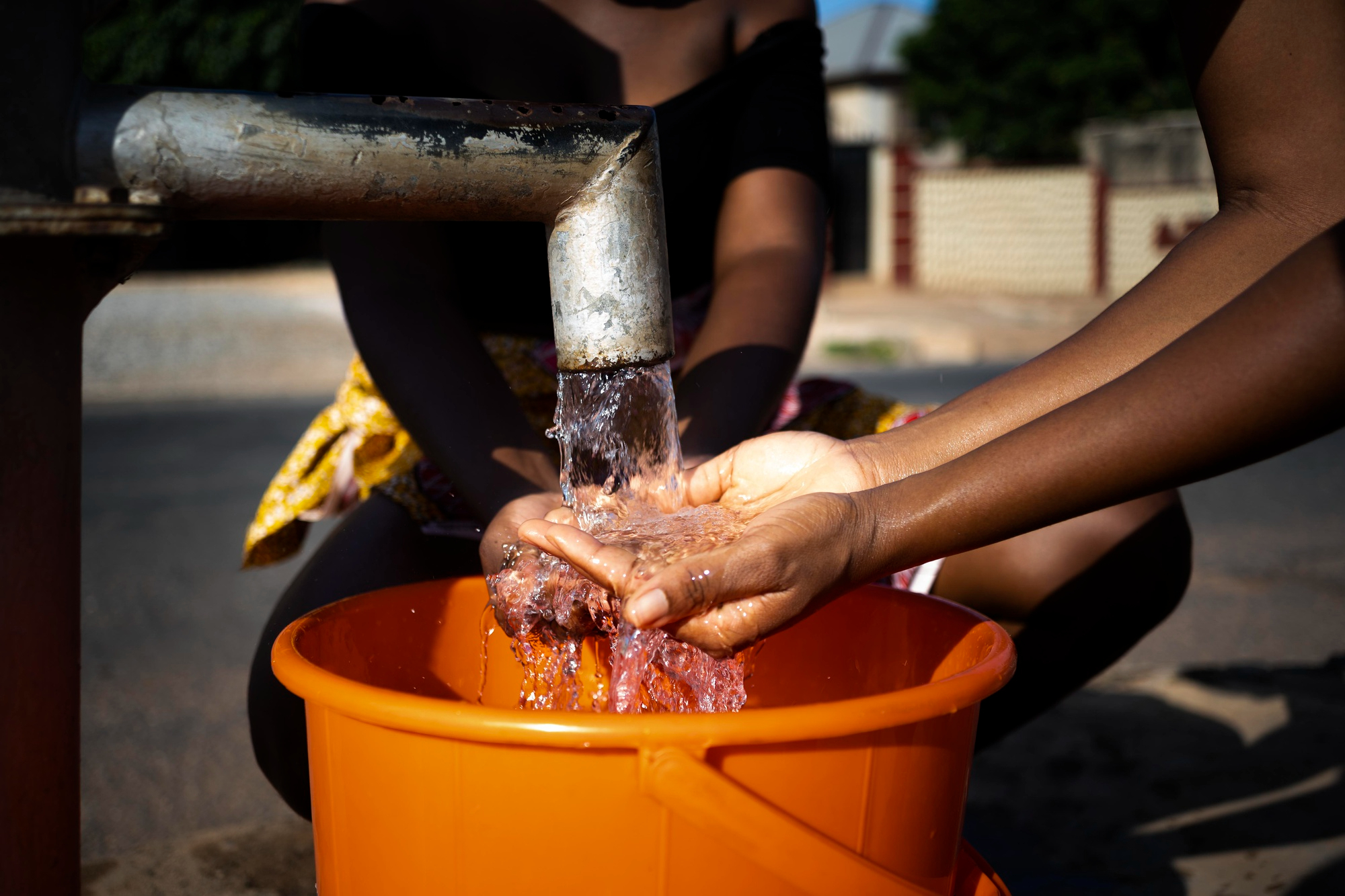 Water filtration community hand-washing distribution